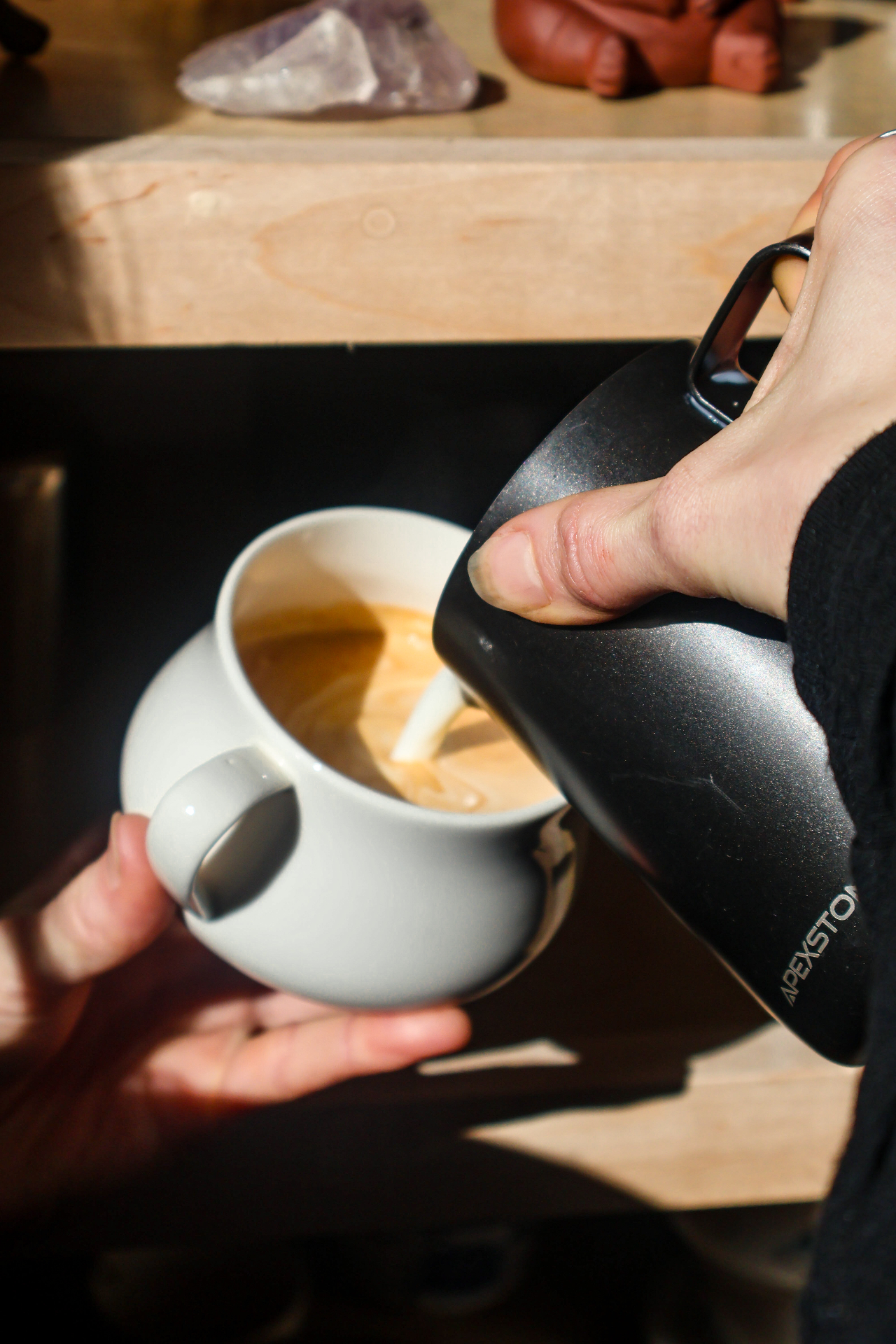 A latte being poured, Plant Bar Chattanooga