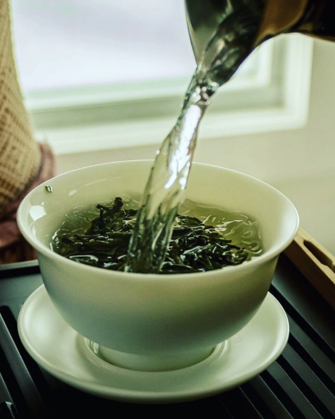 Hot water poured into a gaiwan