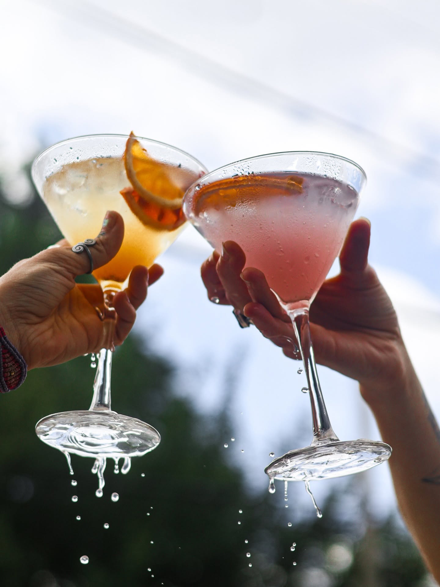 Sunlit cheers with two MerTail martinis