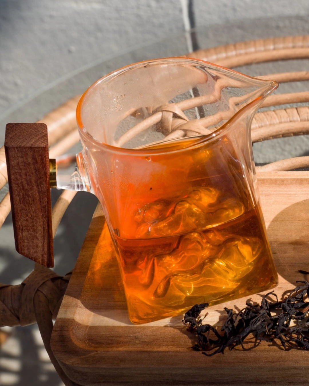 Wood-handled pitcher in the sun, Plant Bar Traditional Tea