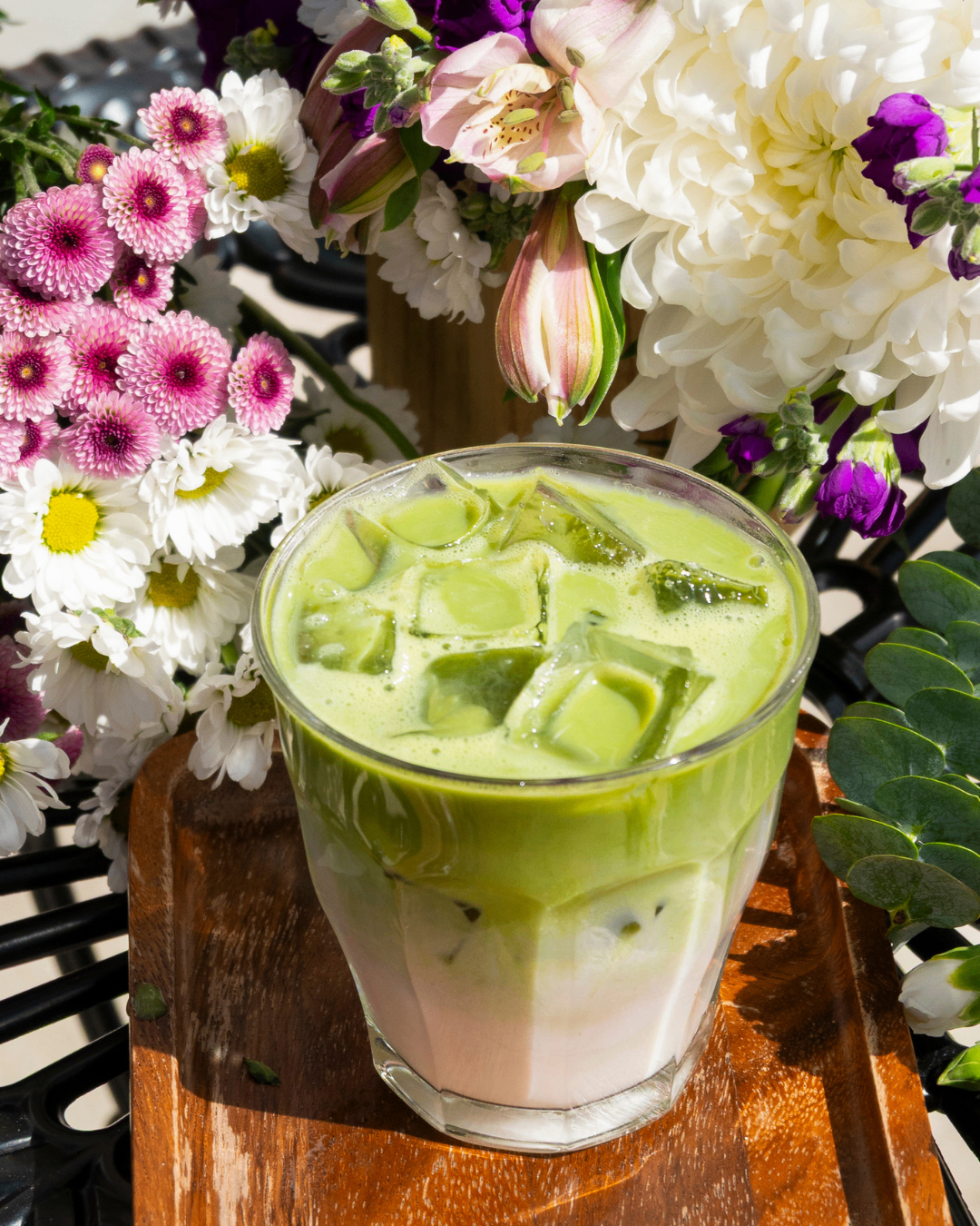 Iced matcha among spring flowers, Plant Bar Matcha