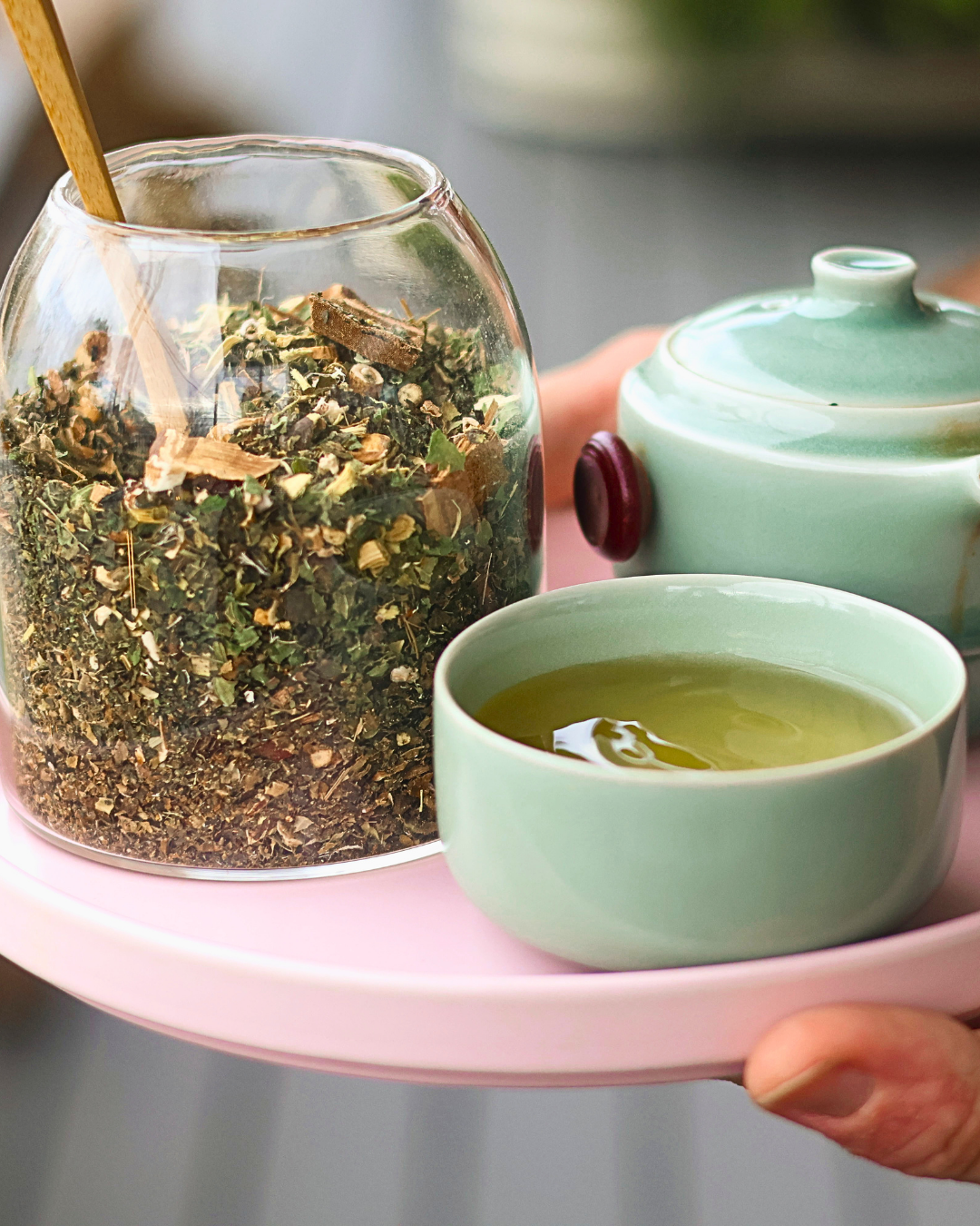 Herbal blend with celadon teapot and cup
