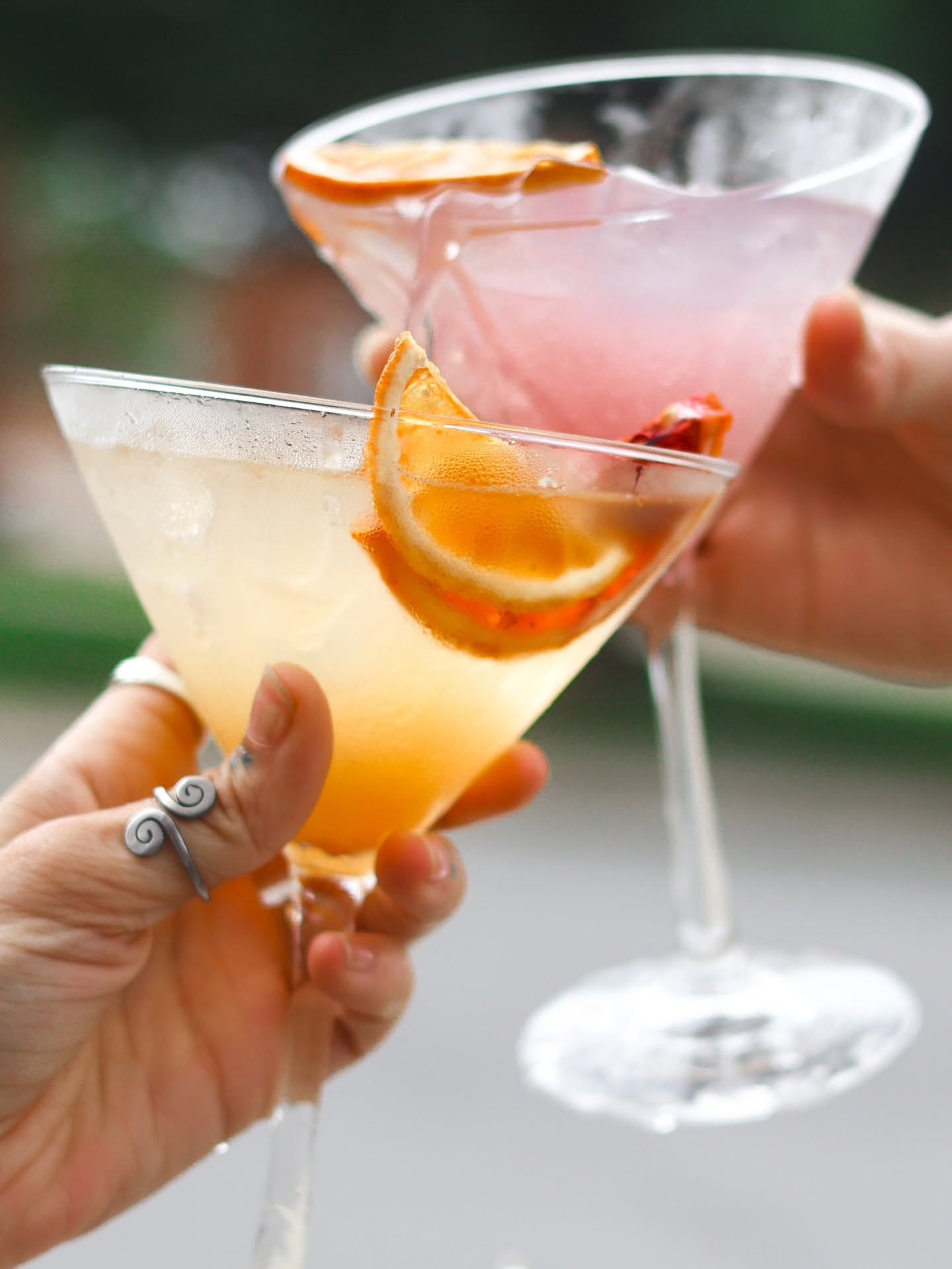 Two MerTails toasting in coupes