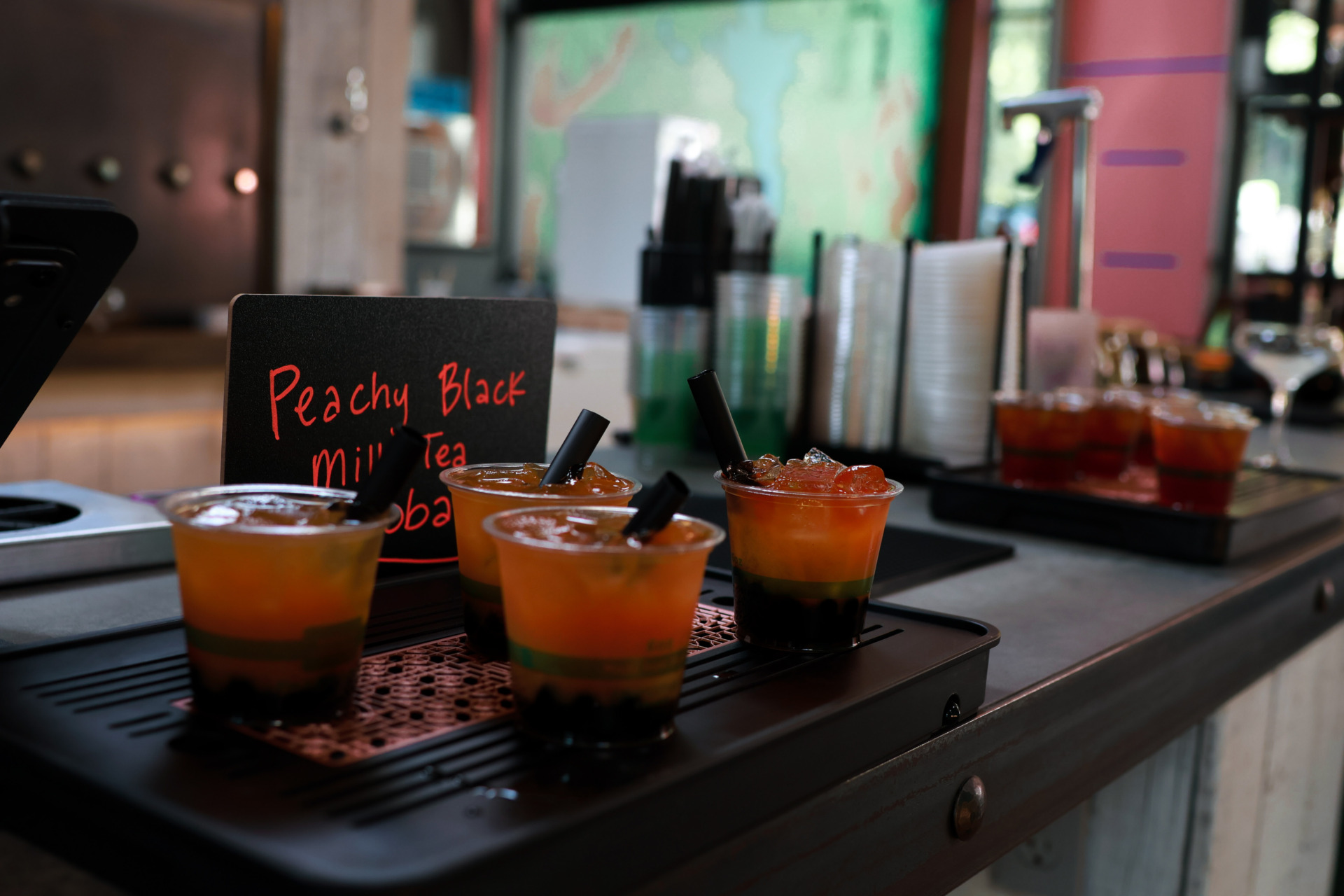 Peachy Black Milk Tea Boba with tapioca pearls served at Plant Bar Coffee & Tea in Asheville’s South Slope.