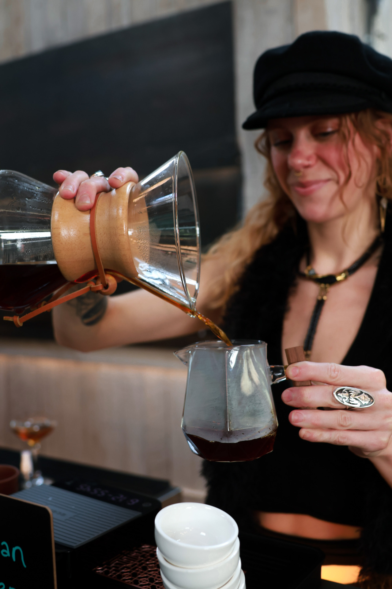 Tara pouring a Chemex brew of Costa Rican Ureña coffee beans at Plant Bar Coffee & Tea in Downtown Asheville.