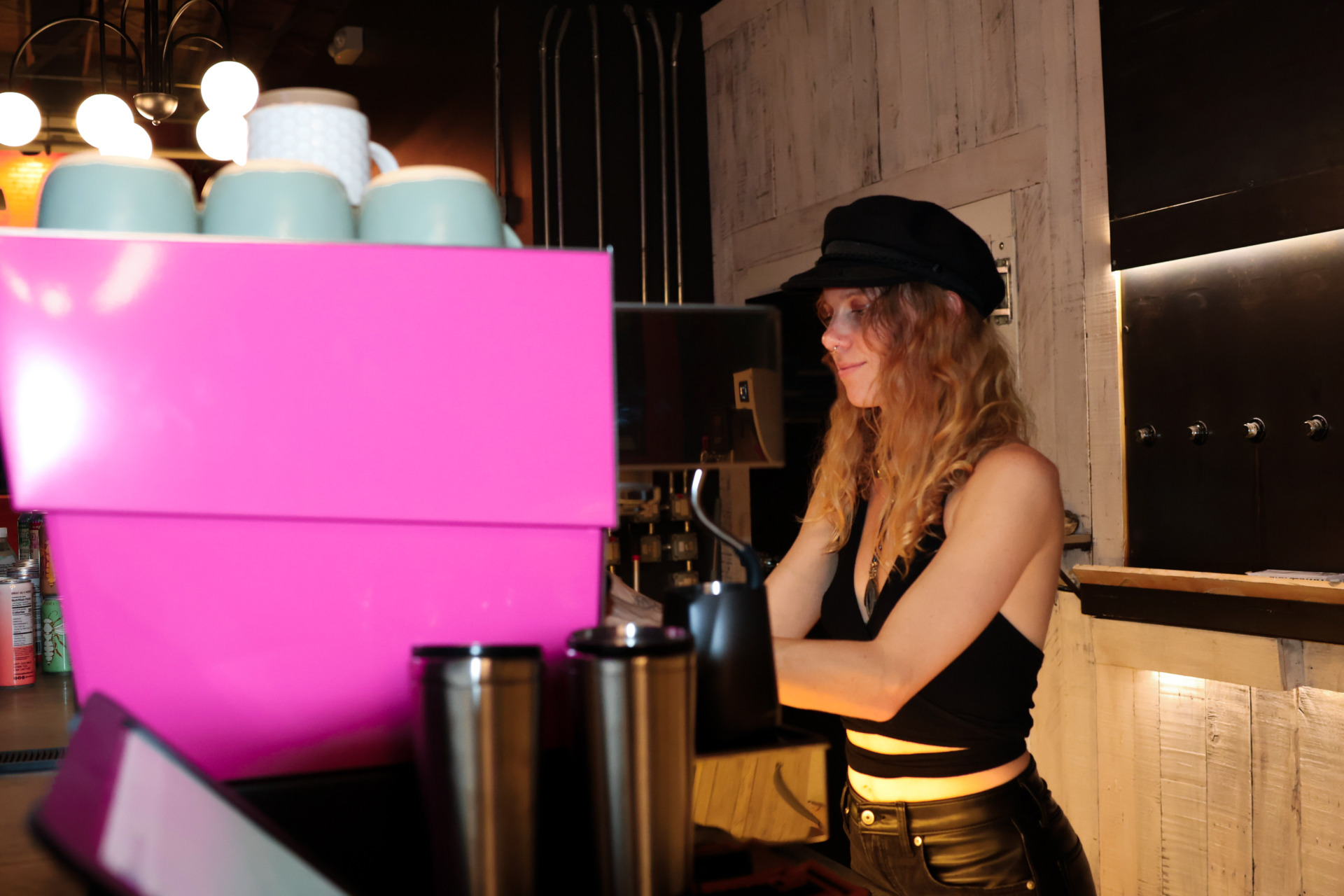 Tara making a latte with Plant Bar’s new La Marzocco espresso machine in Downtown Asheville’s South Slope.